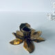 Bougeoir fleur en laiton