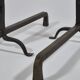 Pair of handforged metal and brass andirons