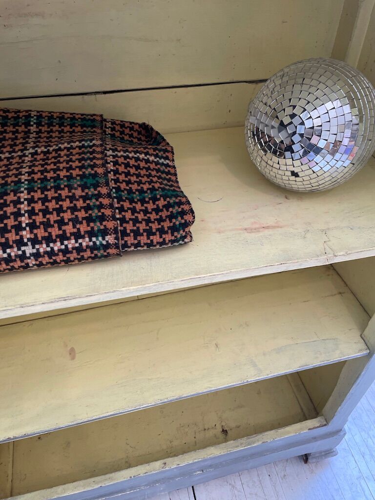 Blue patinated cap cabinet