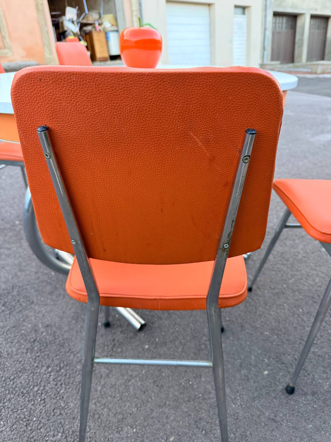 Formica leatherette chair with orange table, vintage 70s Space Age