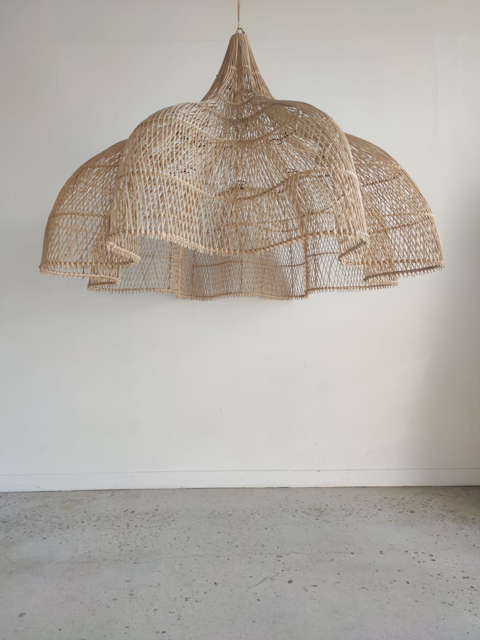 Huge rattan suspension in the shape of a corolla H:1m; D: 1m50