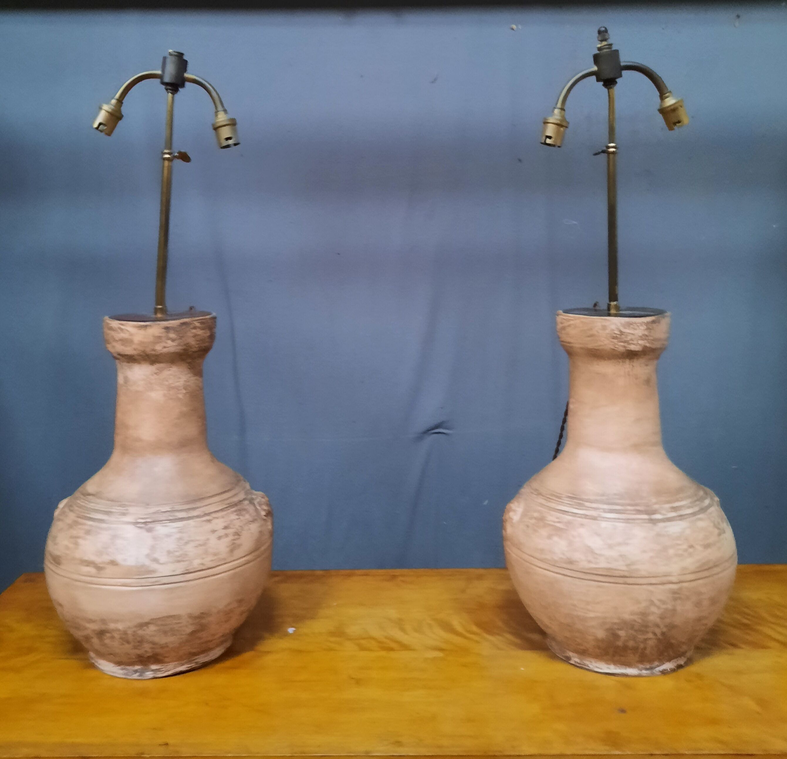 Pair of terracotta lamps
