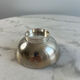 Silver-plated metal bowl — Sleek shape on a stand, modernist style