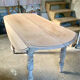 Oval drop-leaf table