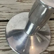 Pair of minimalist polished aluminium candle holders