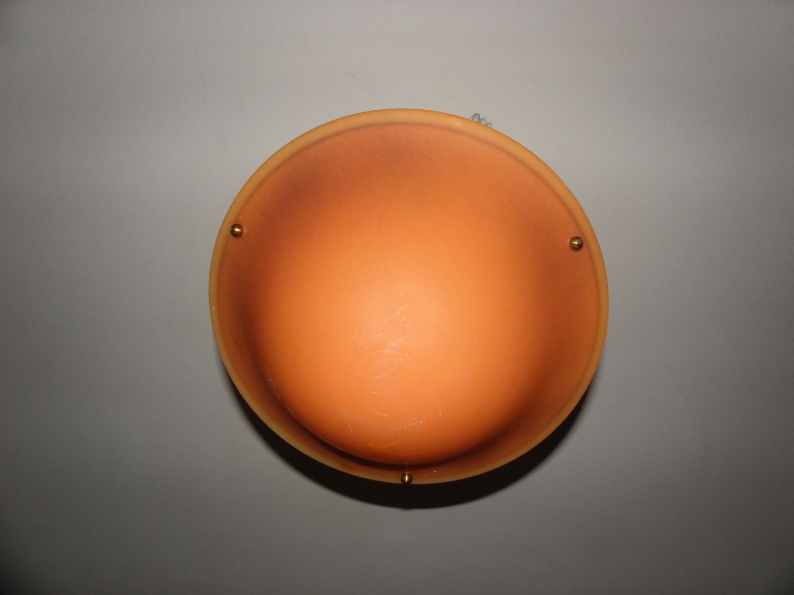 Suspension with orange glass bowl