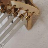 Vintage wall sconce gold metal and stamps