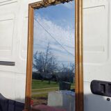 19th century mirror in wood and gilded stucco "scallop shell"