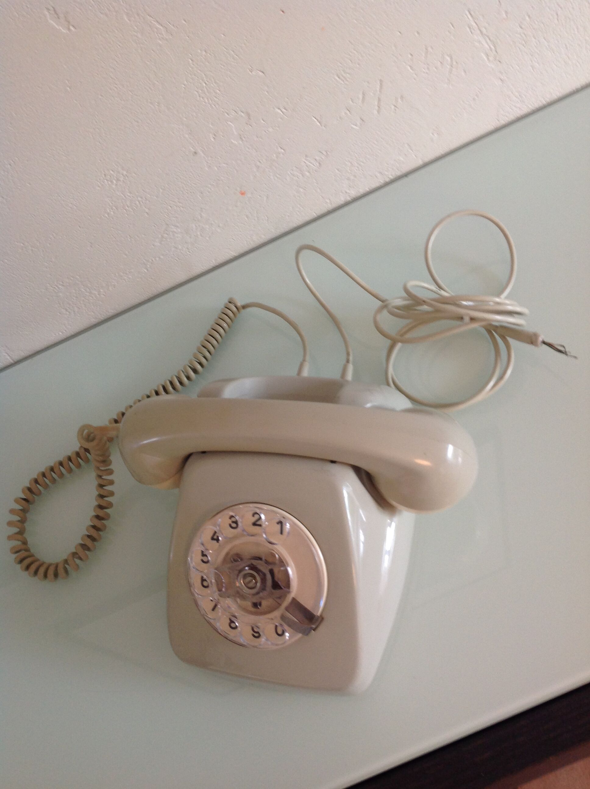 Vintage gray and beige rotary phone