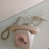 Vintage gray and beige rotary phone
