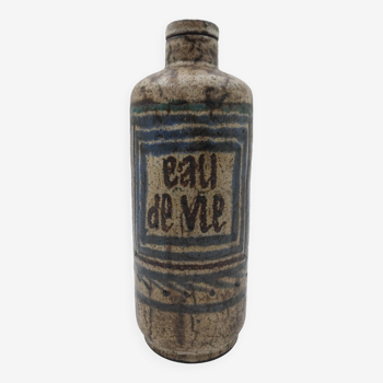 Grande bouteille eau de vie céramique Gustave Reynaud signée le Murier
