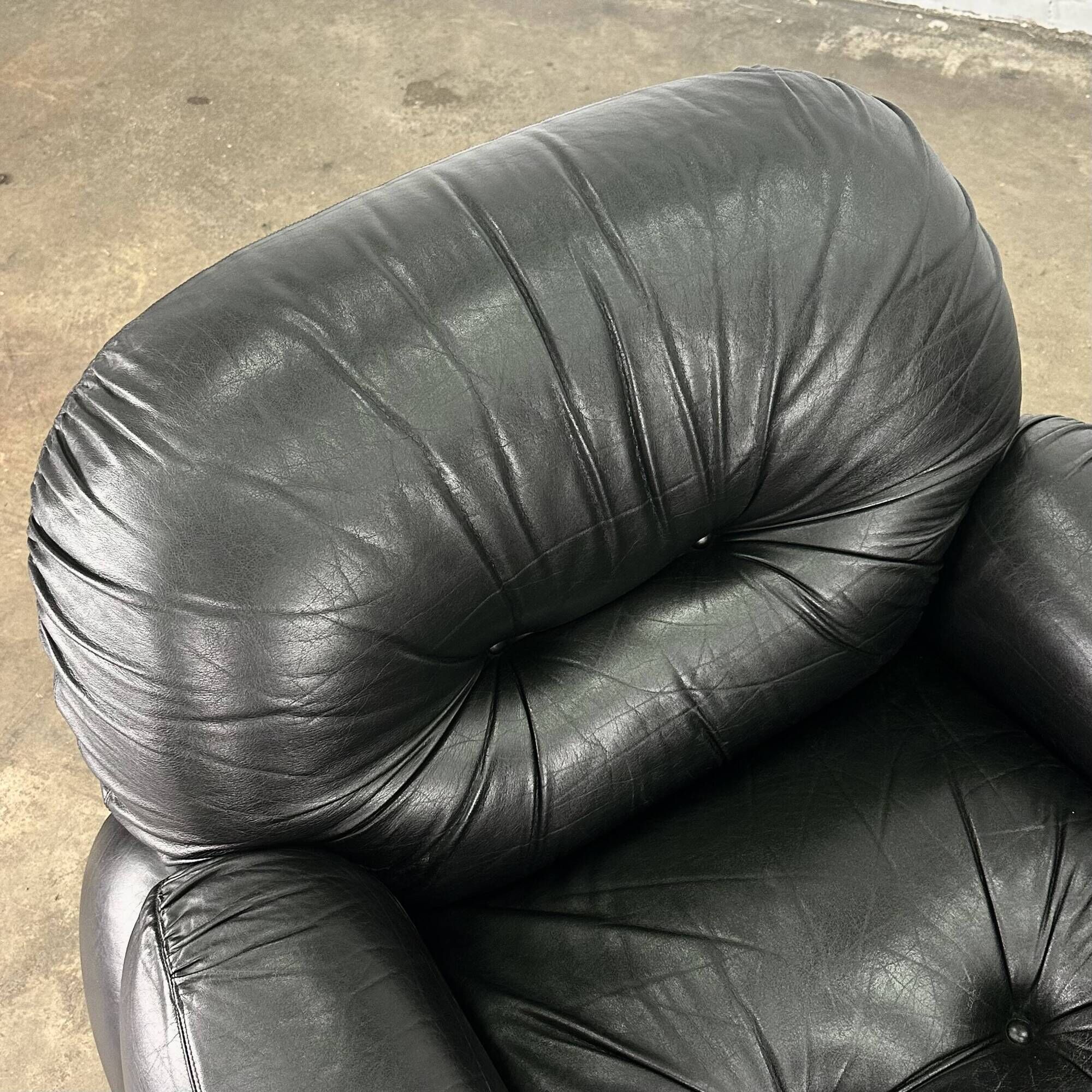 Okay armchair by Adriano Piazzesi in black leather with ottoman