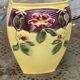Yellow glazed ceramic slip vase with hawthorn pink flower motif