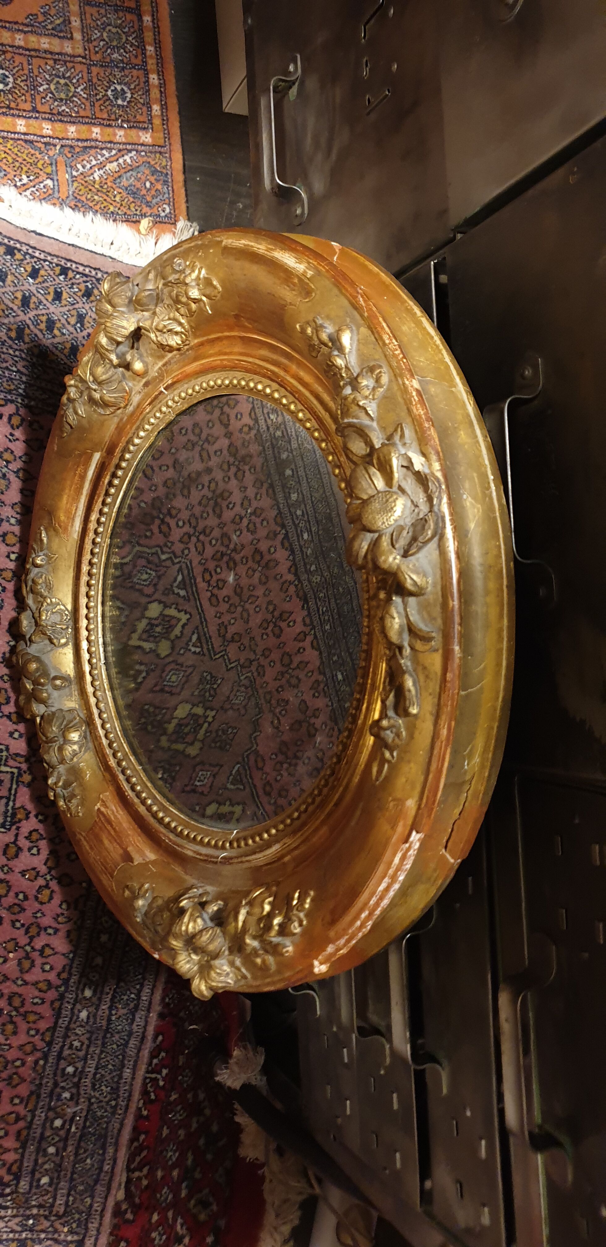 Oval mirror XIXth 43x56cm