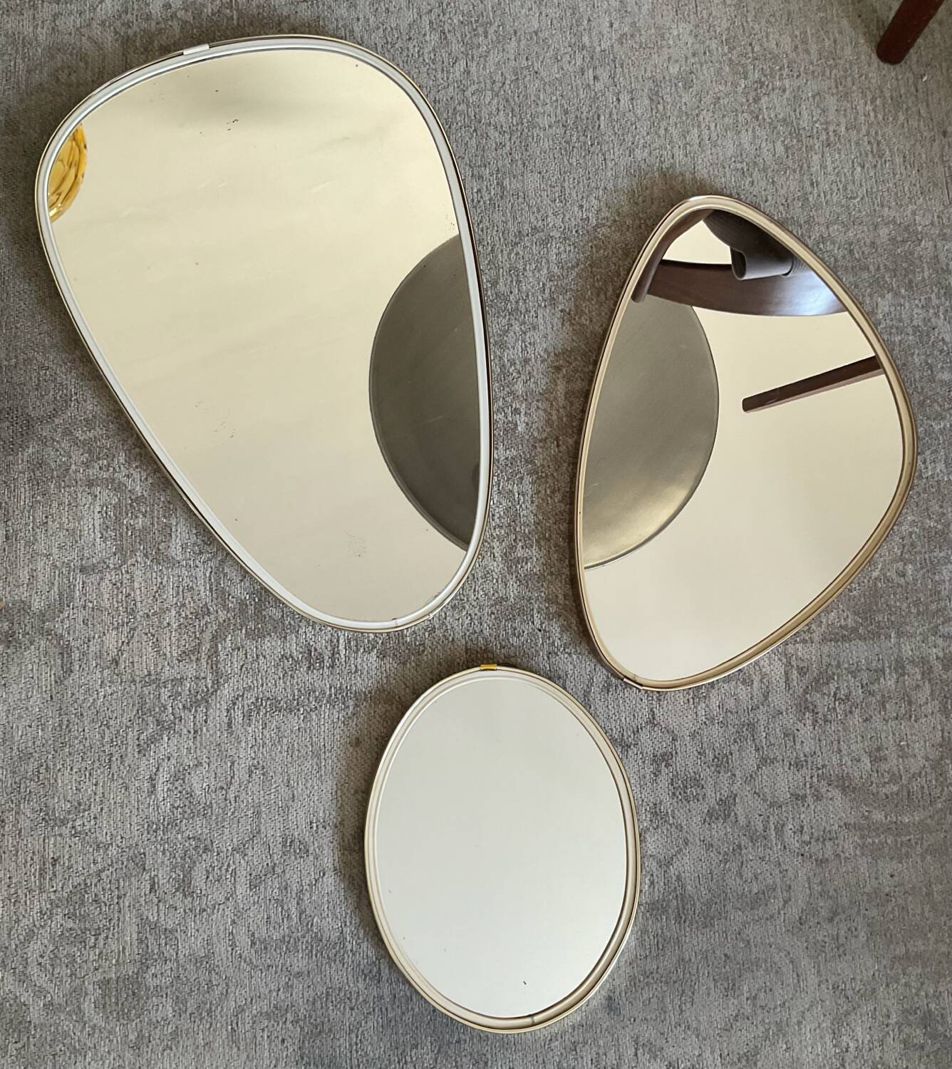 Trio of asymmetrical free-form mirrors from the 60s and 70s