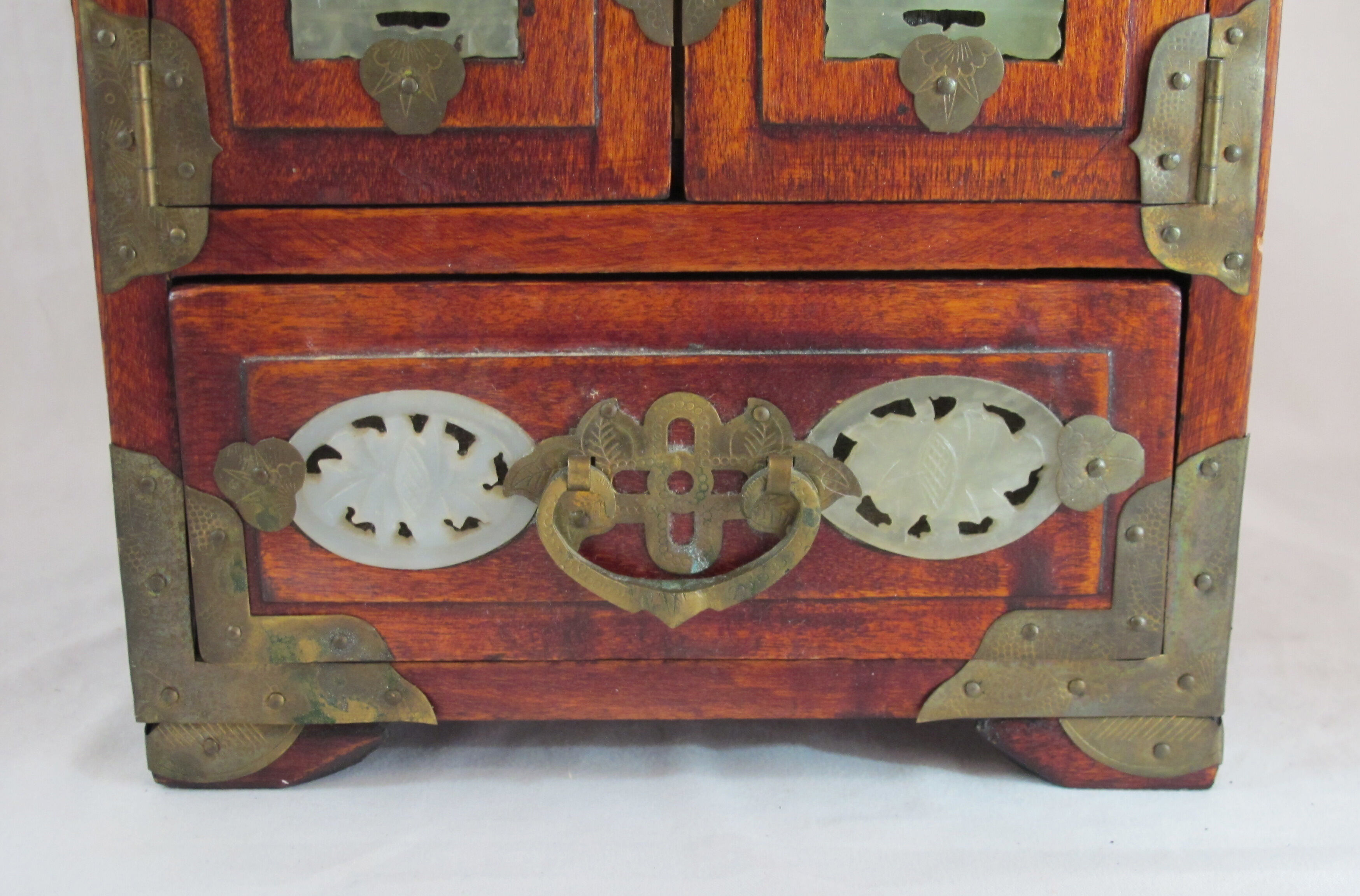 Chinese wooden jewelry box adorned with jade plates
