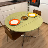 Round extendable folding Formica table with metal legs from the 50s/60s in green.