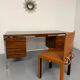 Vintage desk with rosewood veneer and chrome metal design from the 1970s.