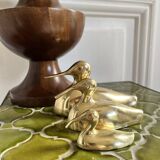Three brass ducks from the 1950s