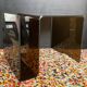 Smoked plexiglass magazine rack side table from the 70s