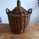 Dame Jeanne in her wicker and rattan clothing
