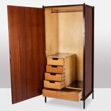 Pair of mahogany veneer and black lacquered iron cabinets. 1950s.