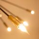 Sputnik-shaped chandelier in patinated gold-plated brass and black lacquer. Contemporary.