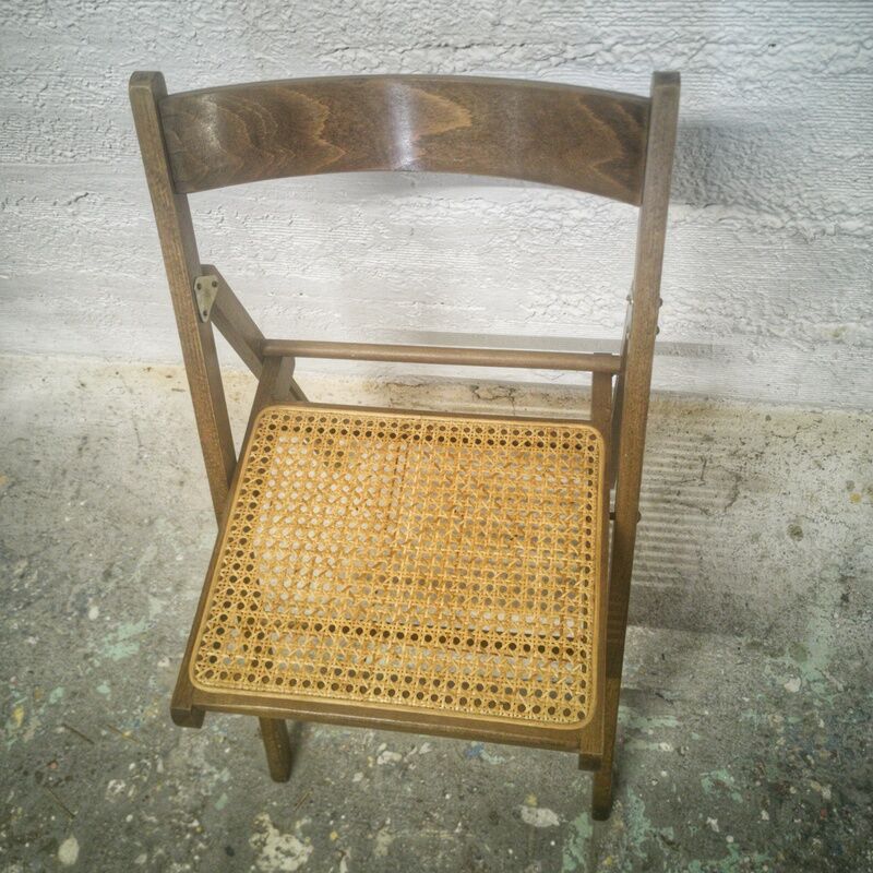 Folding chair with canned seat