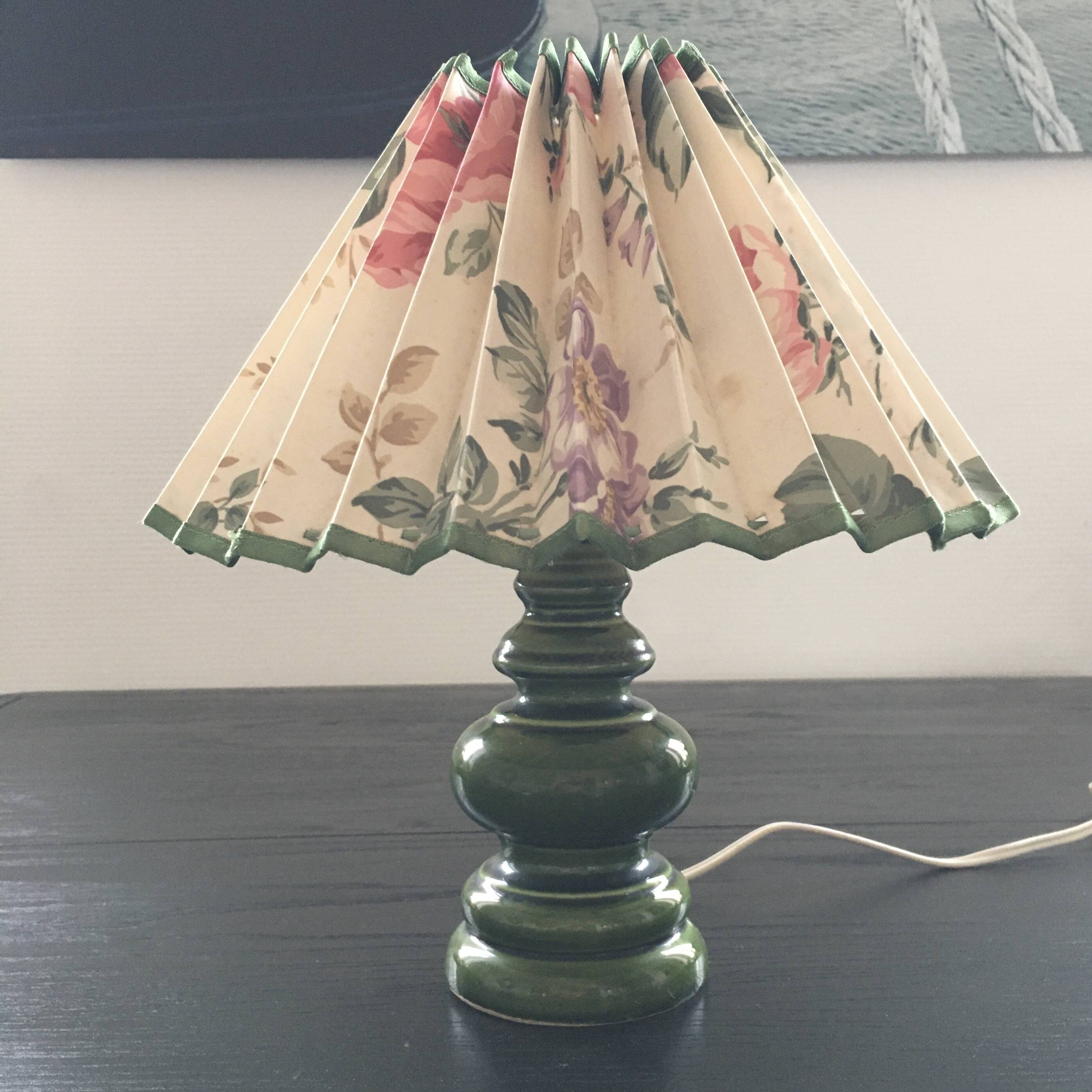 Green ceramic lamp and flowered lampshade