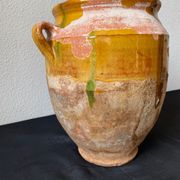 Old grease pot in glazed yellow terracotta, France nineteenth century