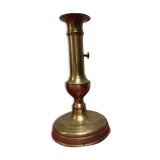 Candle holder with push button