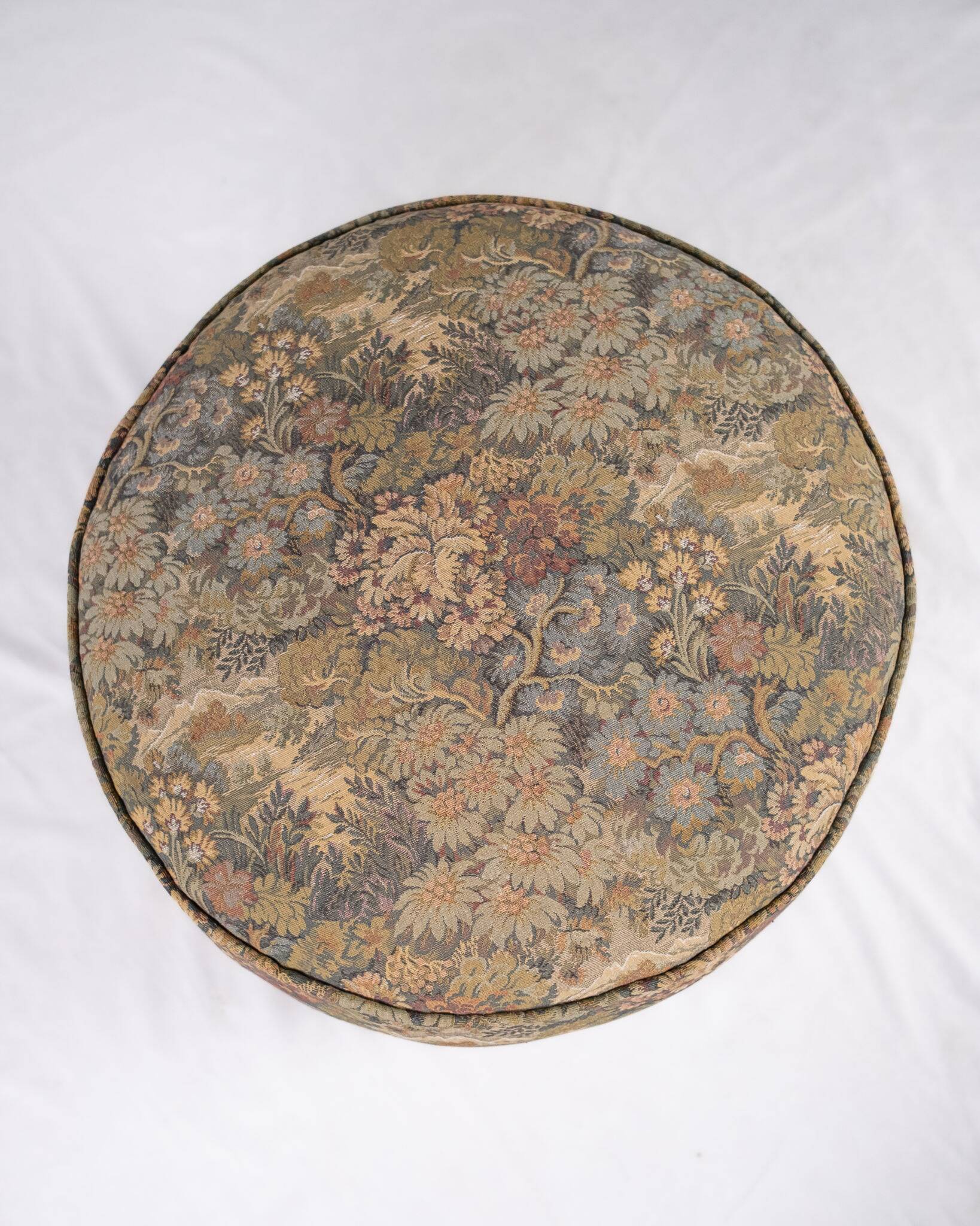 Upholstered pouf in verdure tapestry style, France, late 19th century.