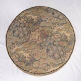 Upholstered pouf in verdure tapestry style, France, late 19th century.