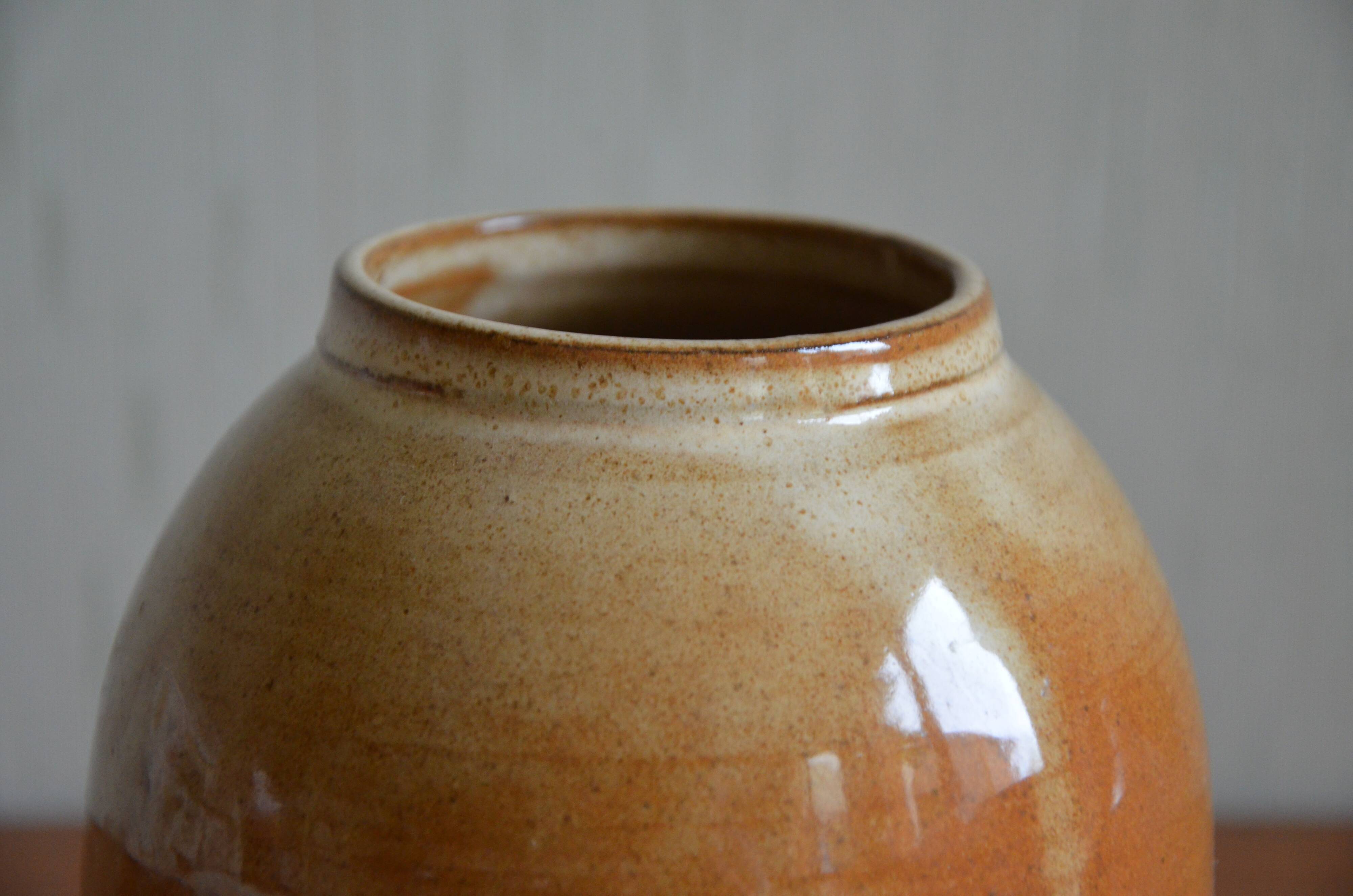Small varnished sandstone vase