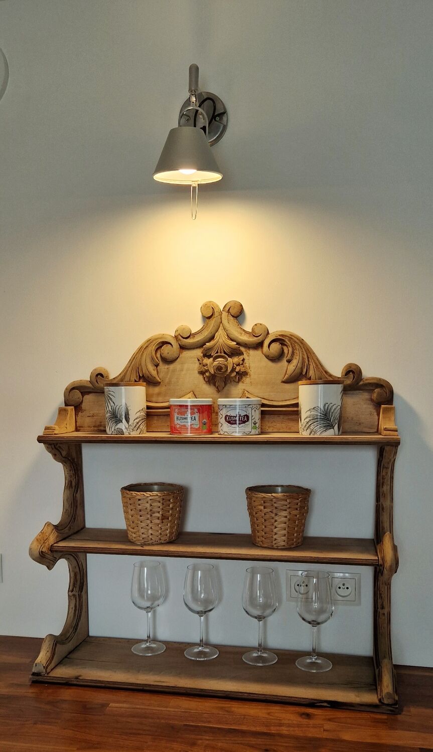 Old wall shelf carved in walnut
