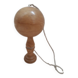 Old bilboquet in blond wood