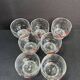 Enamelled glass service signed