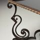 Wrought iron coffee table with mirror glass