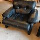 Pair of designer leather armchairs by Tobia Scarpa.