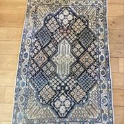 Carpet from the Irian region, 20th century, made of wool and silk.