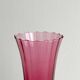 Translucent glass vase on a stand