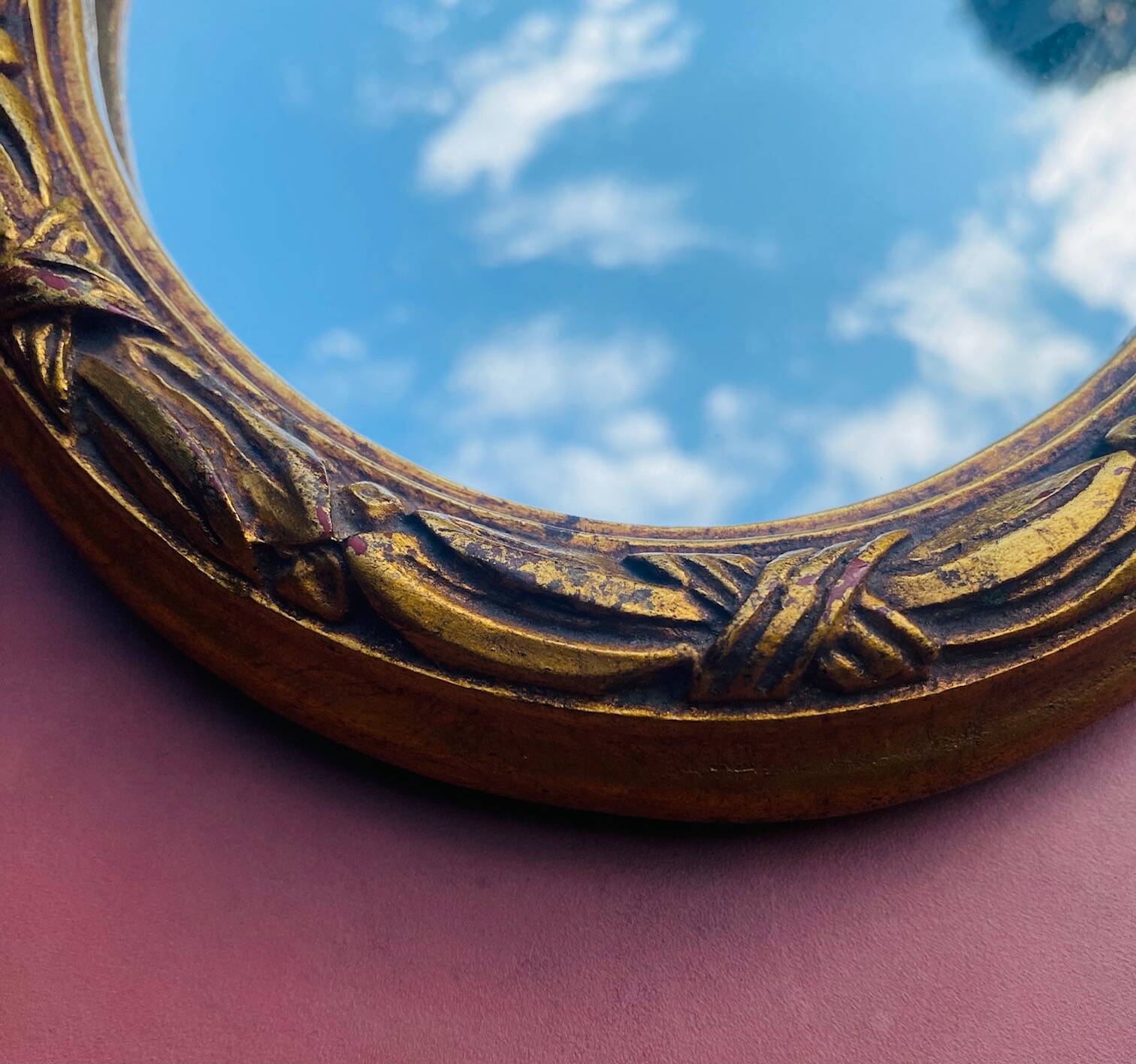 Small antique oval gilt mirror