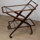 Vintage wooden and glass rolling trolley, 1960