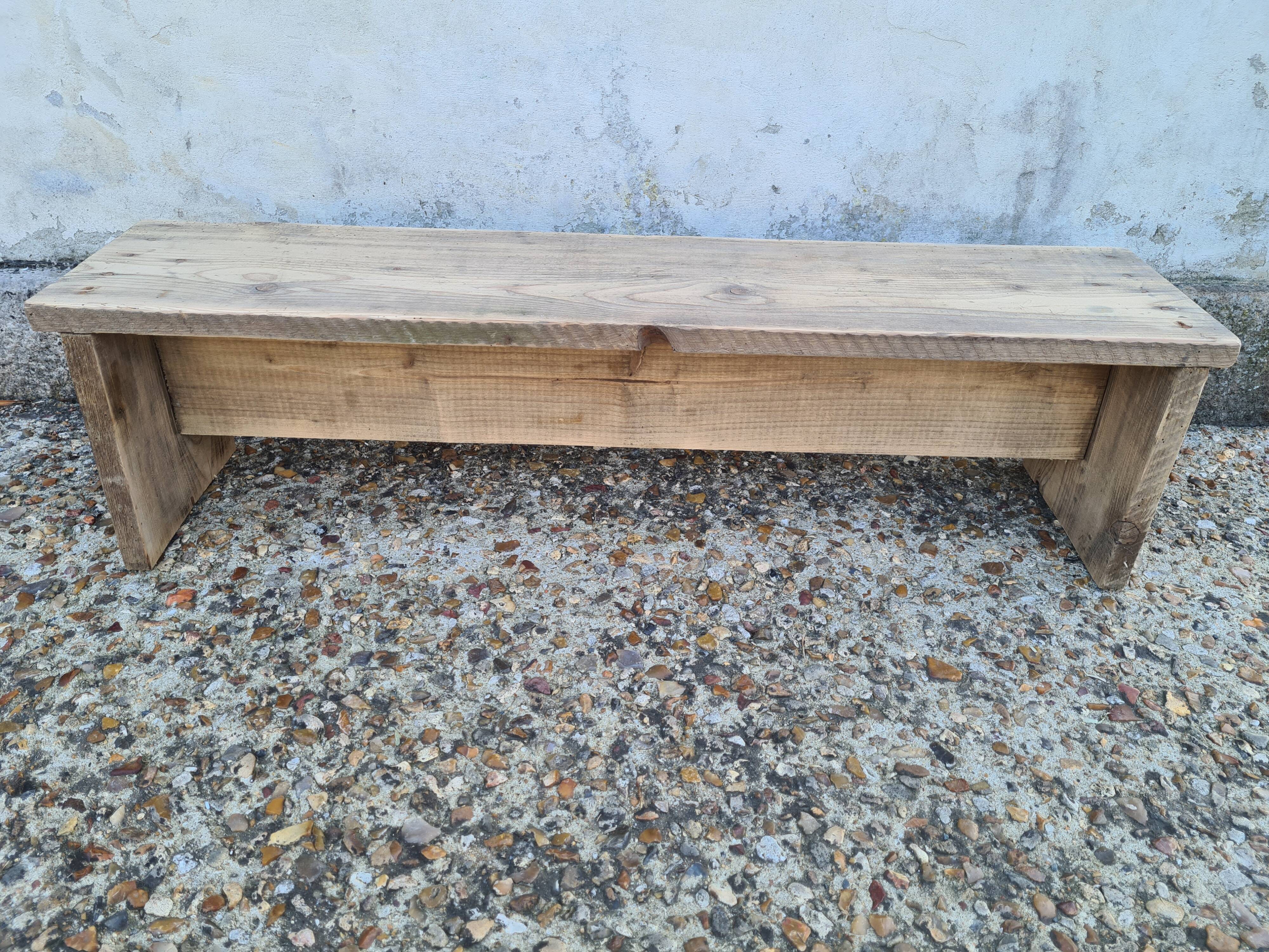 Small raw wood bench