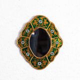 Golden mirror with decor