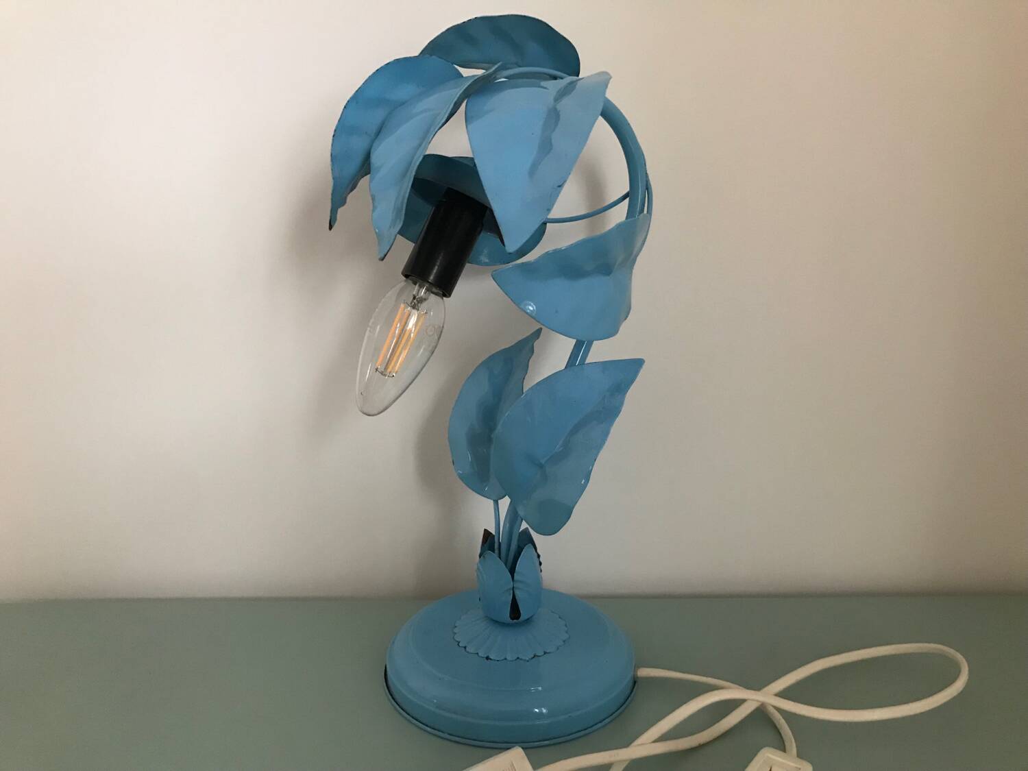 Antique plant-shaped lamp in blue enamelled metal