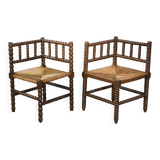 Pair of turned wooden corner chairs from the 1950s.