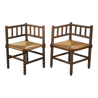 Pair of turned wooden corner chairs from the 1950s.