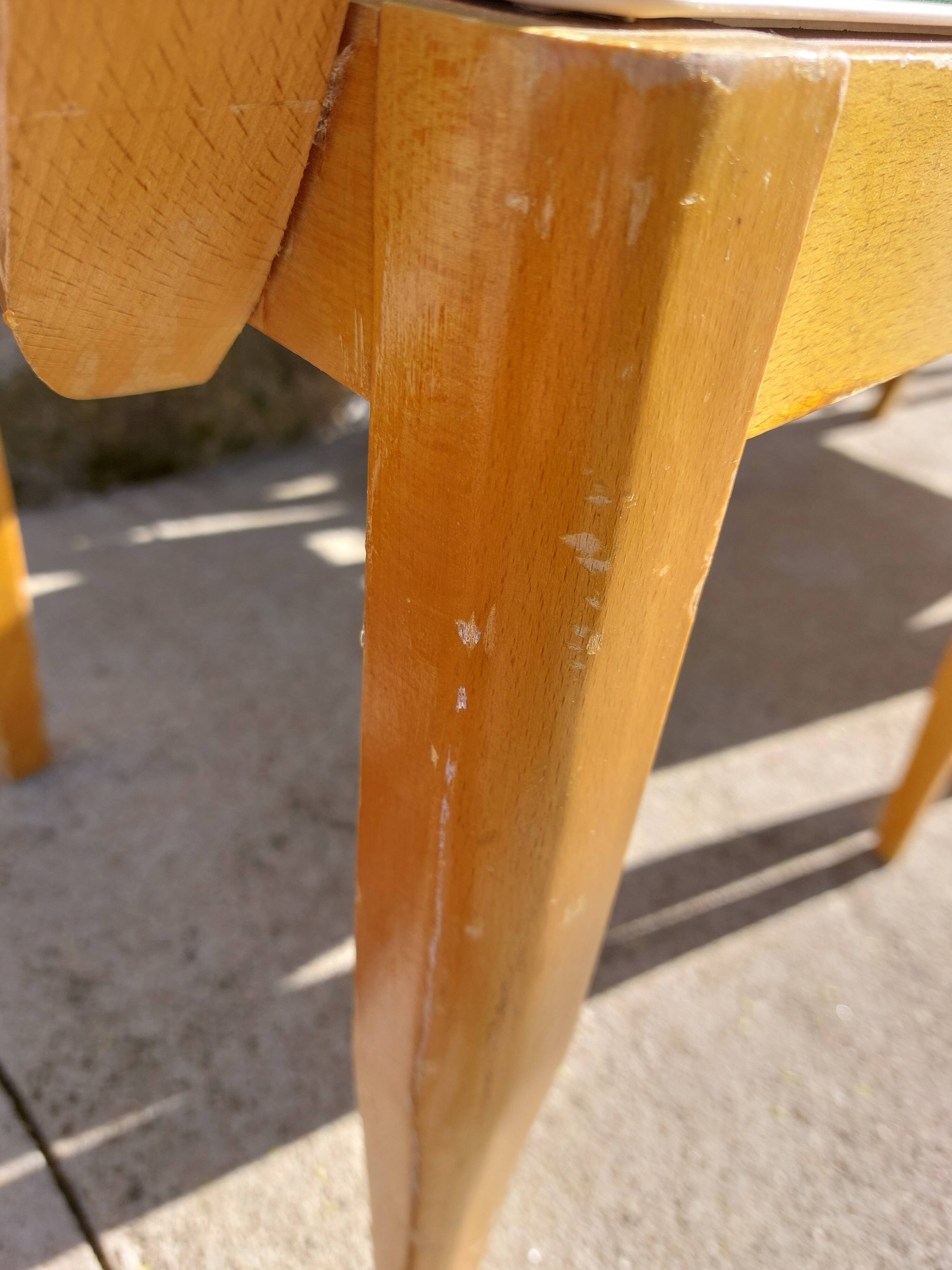 3 vintage bridge chairs with rounded armrests.