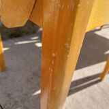 3 vintage bridge chairs with rounded armrests.